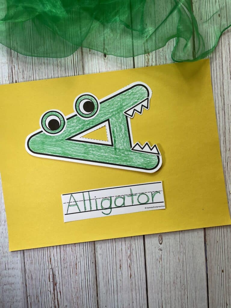 sample of A is for alligator paper craft on yellow construction paper