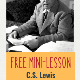 black and white image of C.S. Lewis sitting at a desk with papers in front