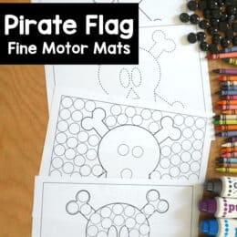 spread out printed pages of pirate-themed dot marker worksheets