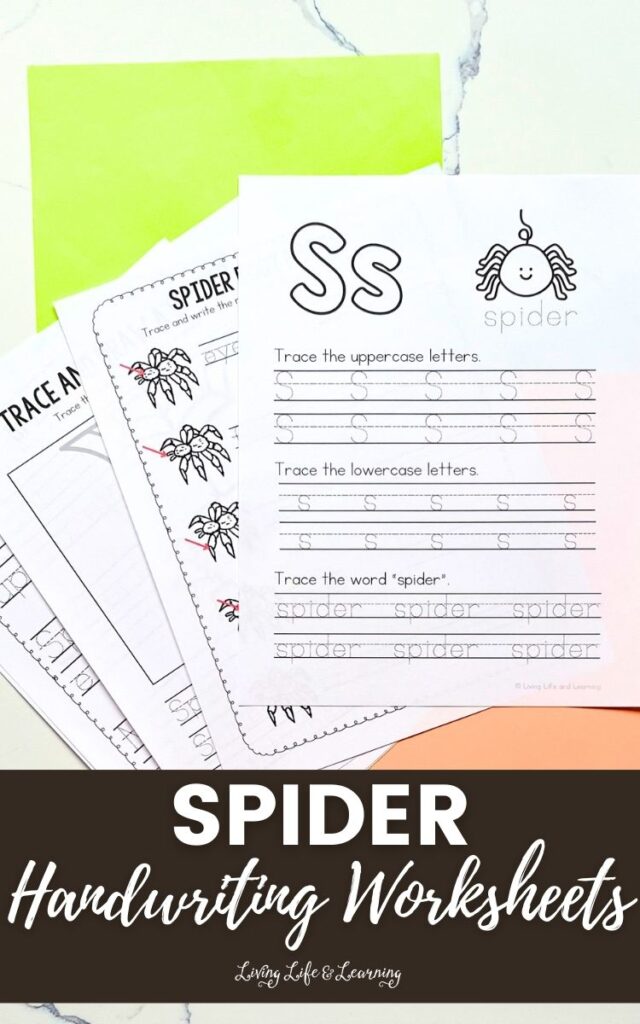 four printed spider handwriting pages fanned out on table top