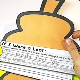orange leaf cutout with writing prompt and handwriting lines
