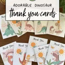 printed color dinosaur themed thank you cards spread out on a table